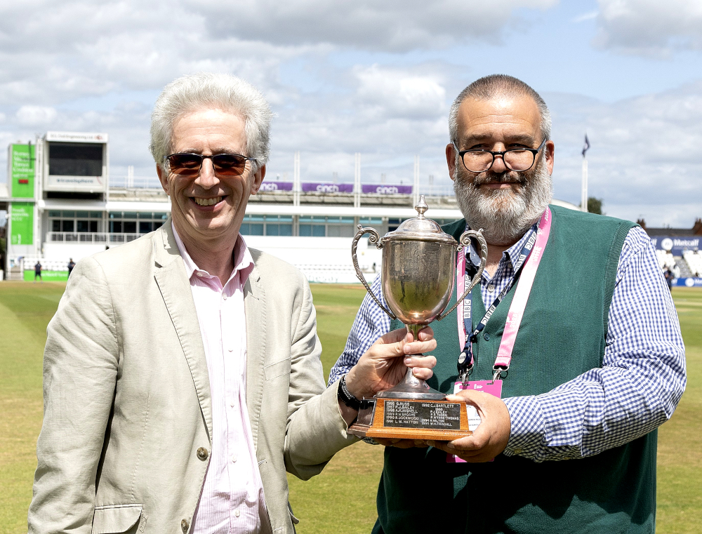 Andrew Radd receives the Brooke-Lambert Trophy from ACS president David Kendix at Northampton in June 2025. Photo: Ray Lawrence/TGS Photo